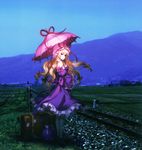  an2a blonde_hair highres long_hair photo_background pink_eyes railroad_tracks solo standing suitcase third-party_edit touhou umbrella yakumo_yukari 