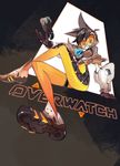  amiami black_hair bodysuit brown_background brown_gloves copyright_name crossed_legs from_below gloves goggles highres looking_at_viewer orange_bodysuit overwatch shoes simple_background sitting smile sneakers solo spandex spiked_hair tracer_(overwatch) triangle 