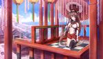  black_legwear blue_sky blurry blush breasts brown_eyes brown_hair building center_opening checkered checkered_floor cherry_blossoms city closed_mouth cloud collar day depth_of_field detached_sleeves harbor head_tilt headgear highres house kantai_collection kneeling lampion large_breasts long_hair outdoors parasol pillar plant ponytail railing red_umbrella shore side_slit single_thighhigh sky smile solo tassel thighhighs tree umbrella underboob untsue very_long_hair water yamato_(kantai_collection) 