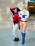  batman_(series) blonde_hair callmepowergirl cleavage_cutout cosplay crossed_arms cutout dc_comics harley_quinn harley_quinn_(cosplay) leotard multiple_girls photo power_girl power_girl_(cosplay) superman_(series) two-tone_hair 