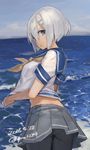  ass beach black_legwear blue_eyes crop_top crop_top_overhang dated from_behind hair_ornament hairclip hamakaze_(kantai_collection) kantai_collection looking_back midriff ocean outdoors panties panties_under_pantyhose pantyhose pleated_skirt school_uniform serafuku short_hair short_sleeves silver_hair skirt skirt_lift solo toro_(konirio) underwear wind wind_lift 