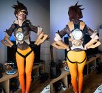 ardsami ass back barefoot belt bodysuit brown_hair cosplay feet figure from_behind goggles hammer leggings looking_at_viewer overwatch room short_hair spandex television tracer_(overwatch) vest wall 