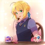  ahoge artoria_pendragon_(all) bangs blonde_hair braid chocolate chocolate_heart coffee_mug cup fate/stay_night fate_(series) green_eyes hair_ribbon heart highres magical_ondine mug necktie open_mouth ribbon saber school_uniform short_hair smile solo sweater_vest union_jack vest 