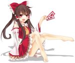  :d ascot barefoot blush bow brown_hair collar detached_sleeves frilled_shirt_collar frilled_skirt frills full_body hair_bow hair_tubes hakurei_reimu highres japanese_clothes knees_up long_hair long_sleeves looking_at_viewer miko moko-rinn ofuda open_mouth red_bow red_eyes red_skirt sidelocks sitting skirt skirt_set smile solo touhou white_background 