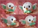  beak bird gen_7_pokemon hands highres multiple_views no_humans open_mouth outstretched_arms owl photo piquipauparro pokemon pokemon_(creature) rowlet stuffed_animal stuffed_bird stuffed_toy unconventional_media watermark web_address 