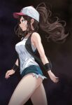  1girl bare_legs baseball_cap black_vest blue_shorts brown_hair closed_mouth cowboy_shot floating_hair from_side frown green_eyes hat high_ponytail highres hilda_(pokemon) long_hair micro_shorts open_clothes open_vest poke_ball_print pokemon pokemon_bw print_headwear profile shirt shorts sleeveless sleeveless_shirt solo tsukishiro_saika vest walking white_headwear white_shirt wristband 