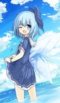  ;d adapted_costume blush bow cirno fanning_crotch hair_bow ice ice_wings large_bow one_eye_closed open_mouth school_uniform serafuku short_hair skirt skirt_lift smile solo touhou wading water wings yuuhagi_(amaretto-no-natsu) 