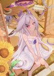  1girl absurdres bare_legs bare_shoulders barefoot black_halo blue_archive blush breasts collarbone commentary demon_girl demon_horns double_strap_slip downblouse dress floating_hair flower food from_above fruit hair_ornament hairclip halo hands_on_own_legs hat highres hina_(blue_archive) horns ko_otori127 long_hair looking_at_viewer looking_up multicolored_halo outdoors parallel_hairclips pink_eyes pink_halo sitting small_breasts smile solo straw_hat sundress sunflower watermelon white_dress white_hair 