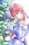  1girl akaneuta_chitose aqua_eyes bare_shoulders blue_dress blue_sleeves blush circlet closed_mouth commentary_request detached_sleeves dress flower genshin_impact hair_flower hair_ornament hands_up highres long_hair long_sleeves looking_at_viewer nilou_(breeze_of_sabaa)_(genshin_impact) nilou_(genshin_impact) official_alternate_costume purple_flower purple_ribbon red_hair ribbon sleeveless sleeveless_dress smile solo very_long_hair 