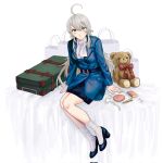  1girl ahoge bag black_shoes black_skirt blue_jacket closed_mouth commentary_request corrupted_twitter_file cosmetics grey_eyes grey_hair hair_between_eyes highres jacket kantai_collection lipstick_tube long_hair long_sleeves looking_at_viewer nidou shoes shopping_bag sitting skirt socks solo stuffed_animal stuffed_toy suitcase teddy_bear washington_(kancolle) white_socks 