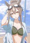  1girl absurdres alternate_costume alternate_hairstyle animal_ears bikini blush breasts brown_hair cardigan cleavage commentary goggles goggles_on_head green_bikini hair_bun hand_in_own_hair highres horse_ears horse_girl jagili_noe long_hair looking_at_viewer medium_breasts open_cardigan open_clothes satono_diamond_(umamusume) single_hair_bun solo swimsuit umamusume upper_body 