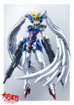  :&gt; arm_cannon armor bodysuit chin_guard earrings gun gundam gundam_wing highres holding holding_gun holding_weapon jewelry mecha_musume rifle smile taiga_hiroyuki tiptoes weapon white_background wing_gundam_zero_custom wings 