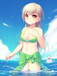  artist_name bangs bare_shoulders bikini blue_sky blueberry_(5959) bow breasts brown_hair cleavage cloud collarbone day eyebrows eyebrows_visible_through_hair green_bikini highres horizon long_hair looking_at_viewer medium_breasts navel ocean original shark sky smile solo swimsuit teeth wading yellow_eyes 