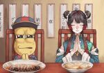  1boy 1girl black_eyes black_hair bow chair chinese_clothes closed_eyes closed_mouth commentary double_bun food food_request hair_bow hair_bun hair_intakes hair_ornament hat highres mode_aim multicolored_hair nijisanji own_hands_together peanuts-kun qingdai_guanmao red_hair sidelocks table teriyakisanta translation_request tsukino_mito two-tone_hair virtual_youtuber white_bow 