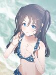  1girl beach bikini black_hair blue_bikini blue_choker blush breasts choker cleavage clover_sucrose floral_print floral_print_bikini half_updo highres idolmaster idolmaster_shiny_colors layered_bikini long_hair looking_at_viewer mitsumine_yuika print_bikini small_breasts solo swimsuit twirling_hair 
