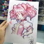  1girl arm_behind_back art_tools_in_frame artist's_hand_in_frame choker commentary cropped_torso dress english_commentary gloves heart kaname_madoka kaname_madoka_(magical_girl) looking_at_viewer magical_girl mahou_shoujo_madoka_magica mahou_shoujo_madoka_magica_(anime) marker_(medium) open_mouth photo_(medium) pink_dress pink_hair red_choker short_twintails signature smile solo soul_gem stanley_lau thank_you traditional_media twintails white_background white_gloves 