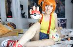  cosplay kasumi_(pokemon) lana_rain looking_at_viewer orange_hair photo poke_ball pokemon short_shorts solo togepi 