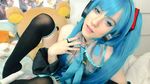 cosplay cyan_hair hatsune_miku lana_rain looking_at_viewer photo pigtails vocaloid 