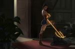  1boy 1girl after_battle armlet ass asymmetrical_hair bare_shoulders black_hair book bound bracer bullet_hole carpet dc_comics desk diana_prince door doorway glowing glowing_weapon greaves gun handgun highres kneehighs kneeling lasso lasso_of_truth long_hair looking_at_viewer lucia_hsiang messy_room open_door paper plant platform_footwear platform_heels shadow skirt stepping strapless superhero tiara weapon wonder_woman wonder_woman_(series) 