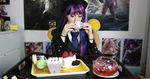  1girl animated animated_gif bangs blue_eyes blue_hair cake cosplay eating holding huge_filesize lana_rain multicolored_hair necktie panty_&amp;_stocking_with_garterbelt pastries photo pink_hair school_uniform skirt solo stocking_(psg) tea uniform 