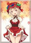  aki_minoriko blonde_hair dress dress_lift food fruit grapes hat highres juliet_sleeves leaf long_sleeves maple_leaf mob_cap mukuroi puffy_sleeves short_hair solo thighs touhou yellow_eyes 