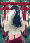  40hara ass black_hair chromatic_aberration glaring highres japanese_clothes long_hair looking_back miko original panties side-tie_panties solo tied_hair torii underwear undressing yellow_eyes 