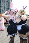  2girls asian blonde_hair breasts brown_eyes cleavage cosplay fat headphones hoshima_mika huge_breasts jewelry multiple_girls necklace nitroplus photo pink_hair star super_pochaco super_pochaco_(cosplay) super_sonico super_sonico_(cosplay) suzumar36 twintails 