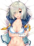  blue_eyes breasts cleavage commentary_request eyebrows eyebrows_visible_through_hair eyes_visible_through_hair gloves hair_ornament hair_over_one_eye hairclip hamakaze_(kantai_collection) highres kantai_collection large_breasts looking_at_viewer navel nironiro on_bed open_mouth school_uniform serafuku short_hair solo upper_body white_gloves white_hair 