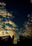  camera cloud highres male_focus night pedestrian_bridge pixiv_festa railing shimei_jien silhouette sky solo stairs star_(sky) starry_sky 
