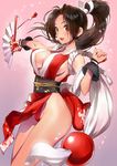  blush breasts brown_eyes brown_hair cleavage eyebrows_visible_through_hair fan folding_fan japanese_clothes large_breasts long_hair looking_at_viewer matsuda_(matsukichi) ponytail shiranui_mai sideboob simple_background smile solo the_king_of_fighters 