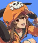  1girl absurdres anchor black_gloves brown_eyes brown_hair fingerless_gloves gloves guilty_gear hat_ornament highres holding holding_anchor hood hoodie jacket looking_at_viewer may_(guilty_gear) orange_headwear orange_hoodie orange_jacket orange_shirt shirt skull_and_crossbones skull_hat_ornament smile solo turoboto 