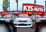  1girl absurdres black_shorts blonde_hair blurry blurry_foreground car car_dealership duz english_commentary furuda_keiko_(duz) grey_hoodie highres hood hood_down hoodie motor_vehicle nissan nissan_s13_silvia nissan_silvia nissan_skyline nissan_skyline_r33 original outdoors parking_lot short_hair shorts solo vehicle_focus vehicle_request 