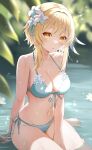  1girl bare_shoulders bikini blonde_hair blush breasts cleavage feather_hair_ornament feathers flower genshin_impact hair_flower hair_ornament highres large_breasts looking_at_viewer lumine_(genshin_impact) medium_hair nasii navel parted_lips pond sidelocks solo swimsuit thighs water wet white_bikini yellow_eyes 