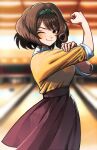  1girl ;) batcheam816 black_hairband blurry blurry_background blush bob_cut bowling_alley brown_hair clenched_hand fingernails hairband highres idolmaster idolmaster_cinderella_girls looking_at_viewer nagatomi_hasumi one_eye_closed red_skirt shirt shirt_tucked_in skirt smile solo yellow_shirt 