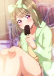  1girl absurdres bare_legs bed_frame blush bow brown_hair commentary_request eating fluffy food food_in_mouth green_hairband green_jacket hairband highres holding holding_food holding_popsicle ice_cream indoors jacket long_sleeves looking_at_viewer love_live! love_live!_nijigasaki_high_school_idol_club medium_hair nakasu_kasumi popsicle popsicle_in_mouth red_eyes shirt sitting solo sophiaenju sparkle yellow_shirt 
