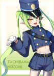  1girl :d absurdres armband belt belt_buckle black_belt blue_archive blue_armband blue_hat blue_jacket blue_shorts blush buckle buttons character_name charm_(object) chinese_commentary commentary_request covered_navel cowboy_shot cropped_jacket double-breasted eyes_visible_through_hair fang fine_fabric_emphasis gloves gradient_background green_background green_hair hand_on_own_hip hand_up hat highres jacket long_hair long_sleeves looking_at_viewer mangguoranliao midriff mixed-language_commentary nozomi_(blue_archive) open_mouth pantyhose peaked_cap pointy_ears short_shorts shorts sidelocks skin_fang smile solo twintails very_long_hair wavy_hair white_gloves white_pantyhose yellow_background yellow_eyes 