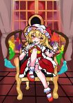 1girl ascot blonde_hair bobby_socks crystal crystal_wings flandre_scarlet fork full_body hat highres holding holding_fork indoors loki_310_11 looking_at_viewer mary_janes mob_cap moon open_mouth puffy_short_sleeves puffy_sleeves red_eyes red_moon shoes short_hair short_sleeves side_ponytail sitting skirt smile socks solo touhou window wings yellow_ascot 