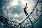  1boy black_eyes black_hair cloud cloudy_sky kite original sky solo standing wenqing_yan wind wind_turbine windmill 