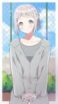  1girl absurdres blue_eyes blue_ribbon border braid camisole chain-link_fence collarbone commentary_request fence flying_sweatdrops gakuen_idolmaster grey_camisole grey_hair grey_jacket grey_pants hair_ribbon half_up_braid highres idolmaster jacket juu_10 katsuragi_lilja looking_at_viewer outdoors outside_border own_hands_together pants partially_unzipped ribbon ribbon_braid solo track_jacket track_pants white_border 