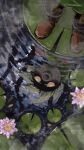  1boy 1other absurdres boots colored_sclera deku_link different_reflection flower from_above gus_uur highres lily_pad link male_focus no_humans outdoors petals petals_on_liquid pink_flower pond rain reflection reflective_liquid ripples solo standing the_legend_of_zelda the_legend_of_zelda:_majora's_mask water yellow_eyes yellow_sclera 