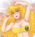  ahoge bandeau blonde_hair blush breasts cleavage commentary covered_nipples cslucaris eyebrows eyebrows_visible_through_hair hair_between_eyes large_breasts long_hair looking_at_viewer lying on_back pov purple_eyes rwby solo strapless unaligned_breasts yang_xiao_long 