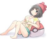  aqua_shorts barefoot black_eyes black_hair hat highres mizuki_(pokemon) navel nekono_rin open_mouth pokemon pokemon_(game) pokemon_sm red_hat shirt short_hair shorts sitting solo tied_shirt 