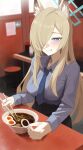  1girl absurdres animal_ears black_skirt blonde_hair blue_archive blue_halo blue_necktie blue_shirt blush breasts chopsticks commentary dog_ears dog_girl extra_ears food hair_over_one_eye halo highres kanna_(blue_archive) long_bangs long_hair medium_breasts mmmaxhi necktie noodles ramen sharp_teeth shirt sitting skirt smile teeth 