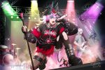 1boy 1girl animal_ears commission cymbals drum drum_set electric_guitar guitar heart highres holding holding_microphone instrument michiaaaaaaaa microphone microphone_stand on_one_knee open_mouth signature solo_focus stage stage_lights vgen_commission wolf_girl 