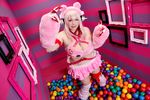  1girl asian breasts chouzuki_maryou cosplay headphones heart large_breasts nitroplus photo pink_hair plump solo super_sonico super_sonico_(cosplay) 