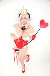  1girl asian breasts chouzuki_maryou cosplay headphones heart large_breasts nitroplus photo pink_hair plump princess_of_hearts solo super_sonico super_sonico_(cosplay) 