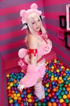  1girl asian breasts chouzuki_maryou cosplay headphones heart large_breasts nitroplus photo pink_hair plump solo super_sonico super_sonico_(cosplay) 