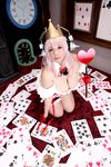  1girl asian breasts chouzuki_maryou cosplay headphones heart large_breasts nitroplus photo pink_hair plump princess_of_hearts solo super_sonico super_sonico_(cosplay) 