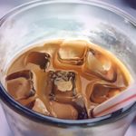  carrot_(supercarrot) coffee cup depth_of_field drink drinking_glass drinking_straw foam food glass ice ice_cube iced_coffee indoors no_humans original photorealistic realistic still_life 