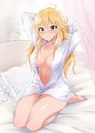  ahoge arms_behind_head barefoot blonde_hair blush breasts cleavage green_eyes highres hoshii_miki idolmaster idolmaster_(classic) kaiga large_breasts long_hair looking_at_viewer naked_shirt navel open_clothes open_shirt pillow shirt smile solo 